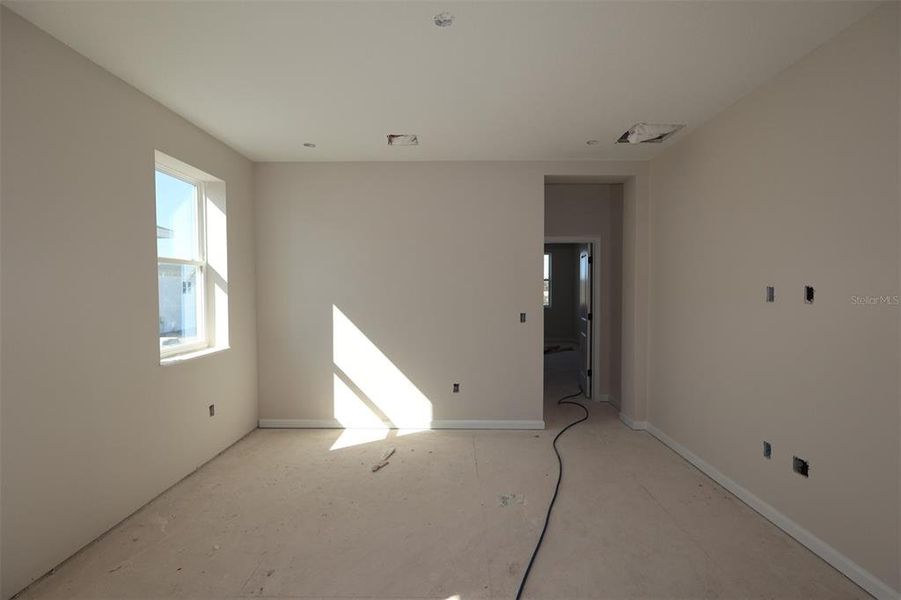 In-progress construction of a new home in Center Lake on the Park, St. Cloud, FL (Image 16).