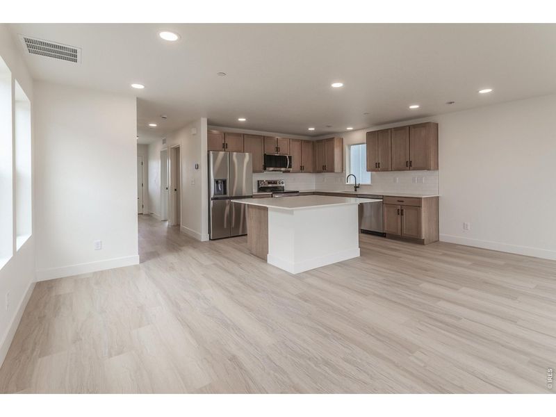 Furnished interior view inside a new home in Bloom Trailblazer Collection - Single Family Homes, Fort Collins (Image 5).