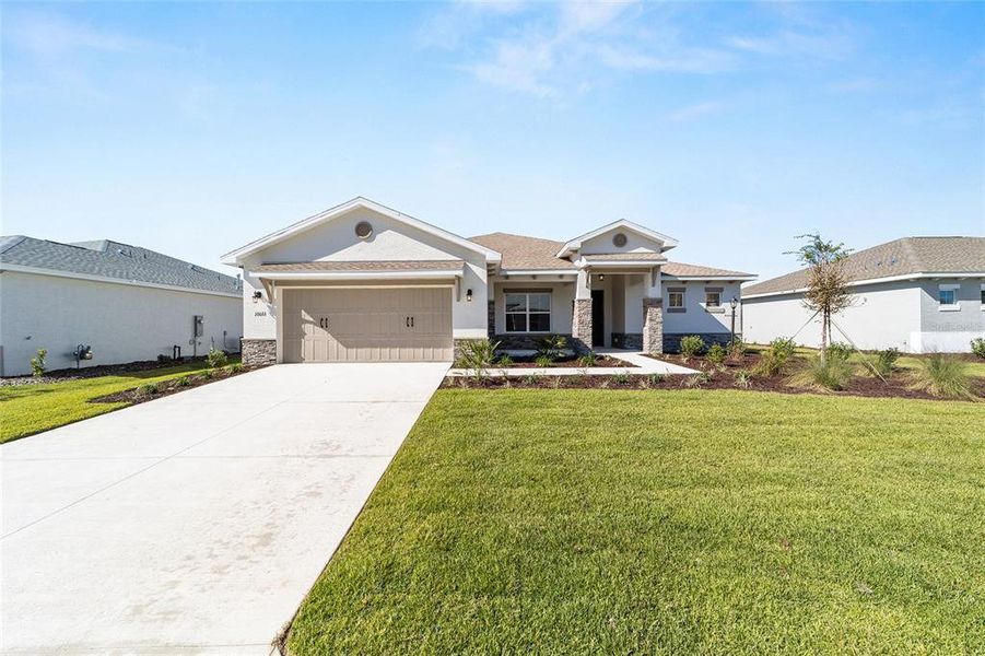 Front exterior of a new home in , Ocala, FL, highlighting curb appeal (Image 19). Front exterior of a new home in , Ocala, FL, highlighting curb appeal (Image 19).