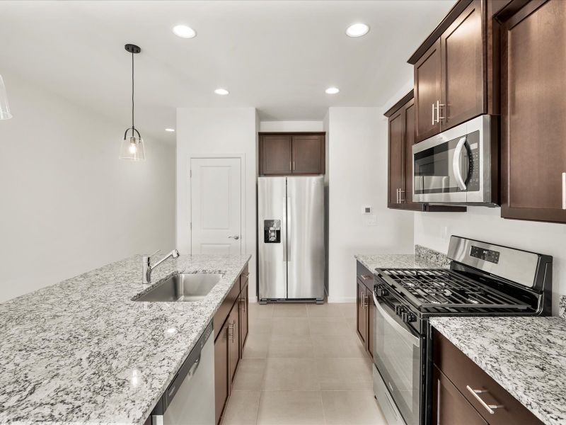Furnished interior view inside a new home in Las Patrias at Star Valley Phase III - Signature Series, Tucson (Image 3). Furnished interior view inside a new home in Las Patrias at Star Valley Phase III - Signature Series, Tucson (Image 3).