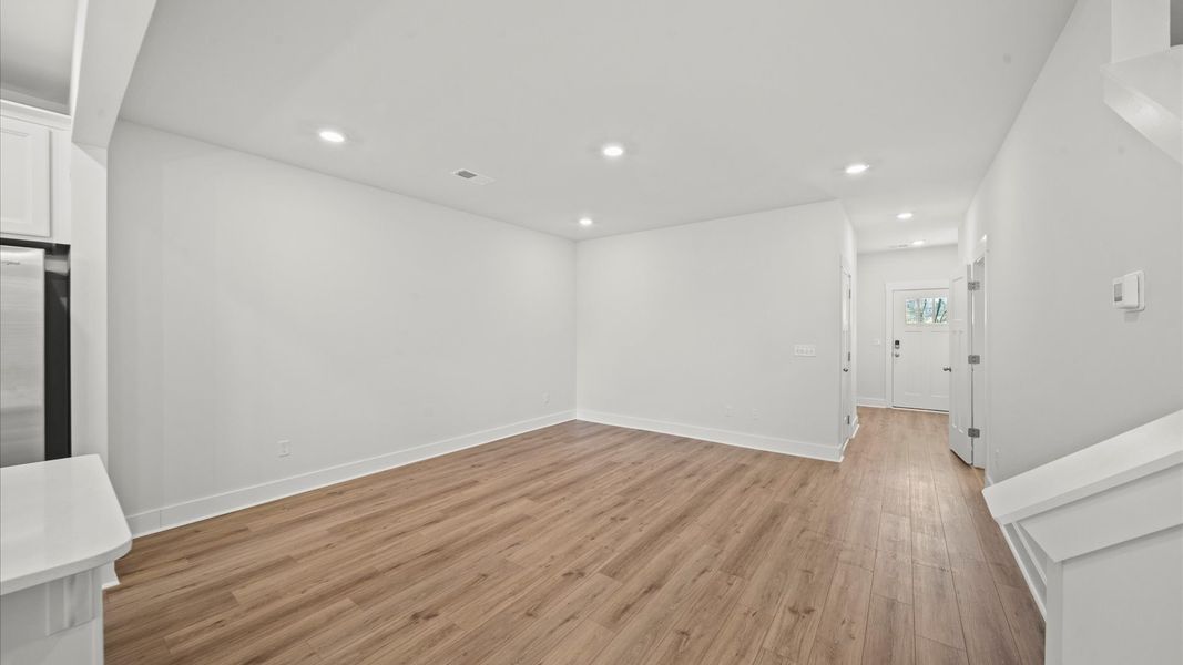 Superior design shines in this open-concept family room with timeless finishes and a modern edge