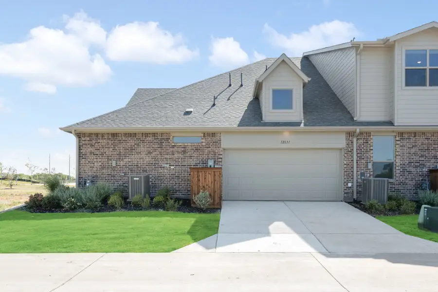 Front exterior of a new home in Cottonwood Creek, Rowlett, TX, highlighting curb appeal (Image 28).
