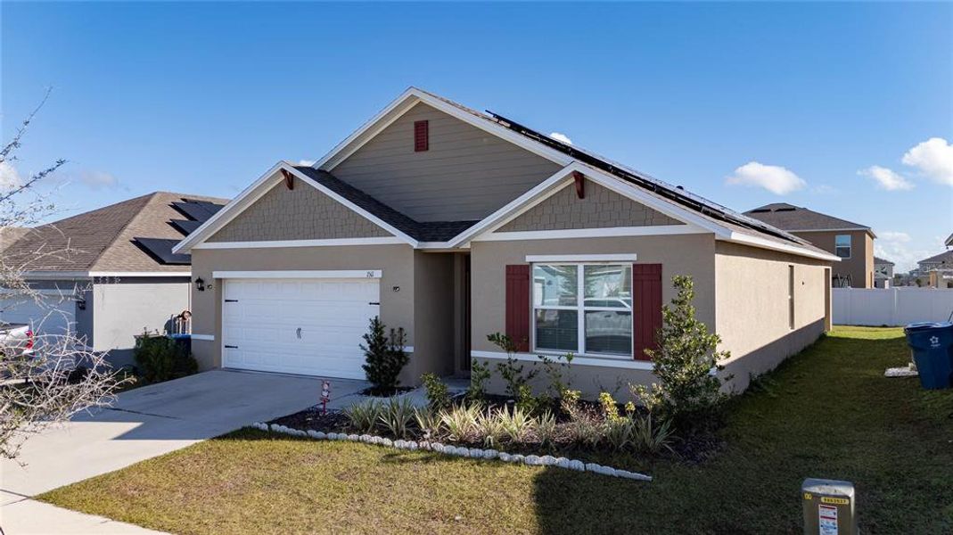 Front exterior of a new home in , Haines City, FL, highlighting curb appeal (Image 20).