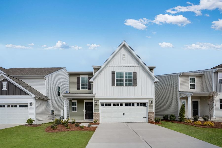 Front exterior of a new home in Oldfield, Camden, SC, highlighting curb appeal (Image 1). Front exterior of a new home in Oldfield, Camden, SC, highlighting curb appeal (Image 1).