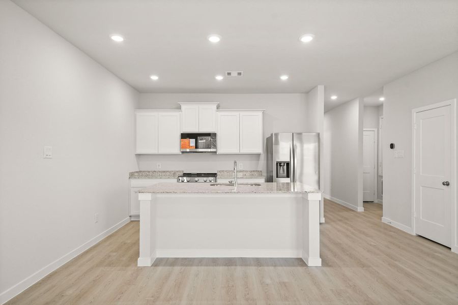 Furnished interior view inside a new home in Lakes at Crockett Martin, Conroe (Image 11).