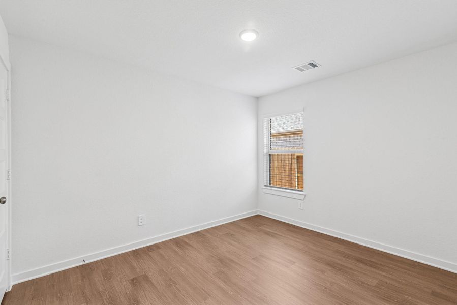 Spacious, unfurnished interior of a new home in Wildrye, Waller (Image 24).