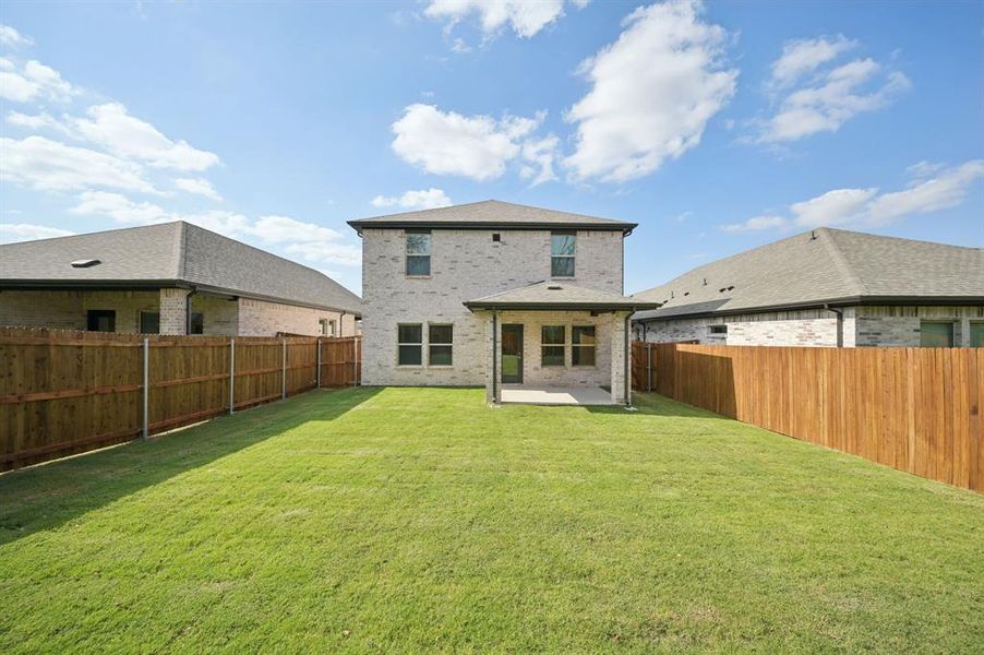 Exterior details and patio area of a home in Eastridge - Spring Series, McKinney (Image 4). Exterior details and patio area of a home in Eastridge - Spring Series, McKinney (Image 4).
