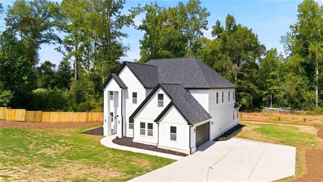 Front exterior of a new home in , Griffin, GA, highlighting curb appeal (Image 29). Front exterior of a new home in , Griffin, GA, highlighting curb appeal (Image 29).