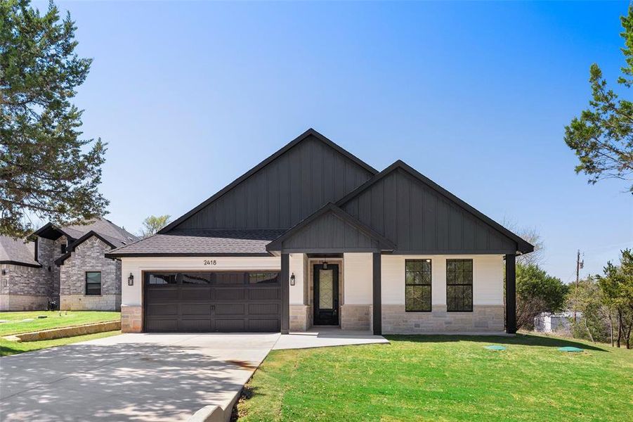 Front exterior of a new home in , Granbury, TX, highlighting curb appeal (Image 2). Front exterior of a new home in , Granbury, TX, highlighting curb appeal (Image 2).