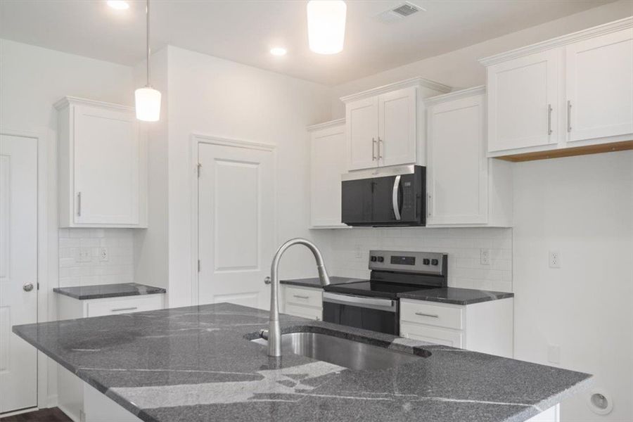 Furnished interior view inside a new home in Brownstone Park, Easley (Image 5).