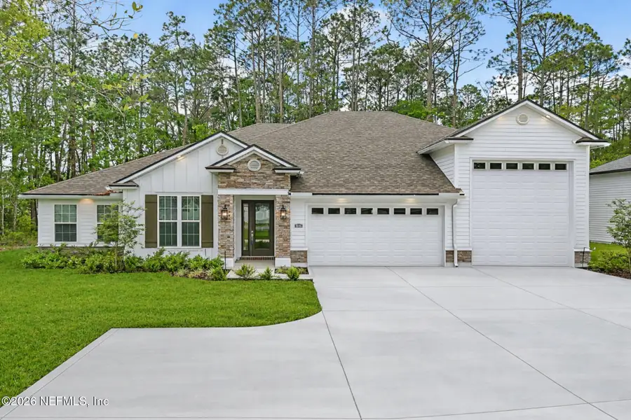 Front exterior of a new home in Goose Creek Estates, Green Cove Springs, FL, highlighting curb appeal (Image 1). Front exterior of a new home in Goose Creek Estates, Green Cove Springs, FL, highlighting curb appeal (Image 1).