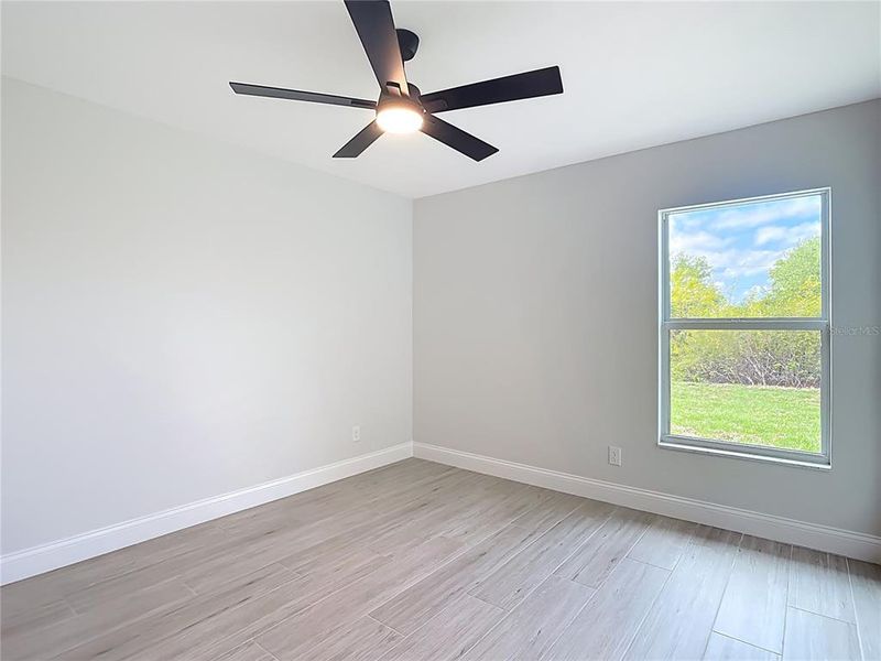 Spacious, unfurnished interior of a new home in , Port Charlotte (Image 18).