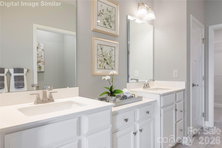 Wake up and step into luxury—your main-level primary bedroom offers direct access to a spa-inspired bath and the open-concept living space beyond. No stairs, no barriers—just seamless flow, effortless comfort, and everyday elegance. It’s the kind of layout that turns routines into rituals.