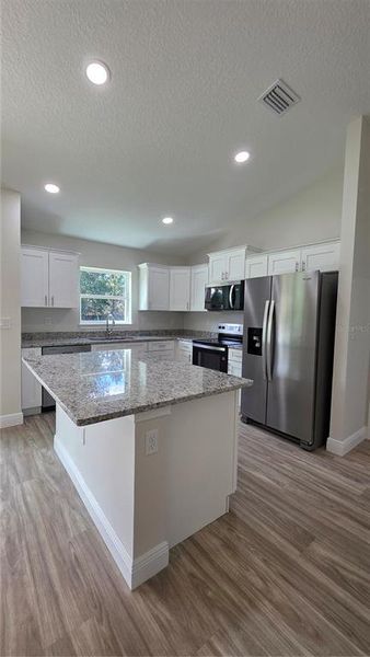 Furnished interior view inside a new home in , Dunnellon (Image 4).
