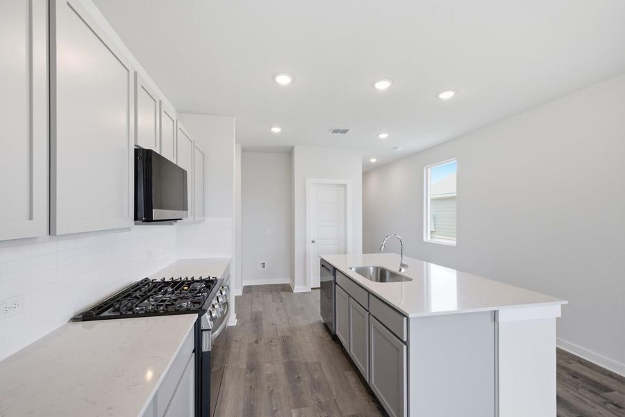 Furnished interior view inside a new home in Stallion Run, Buda (Image 11).
