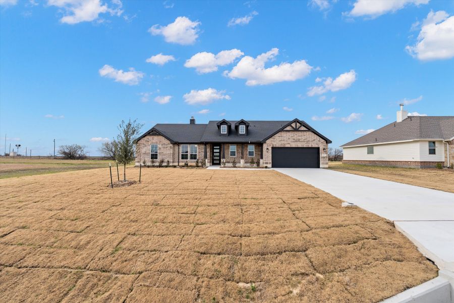 Front exterior of a new home in Fairview Meadows, New Fairview, TX, highlighting curb appeal (Image 25).