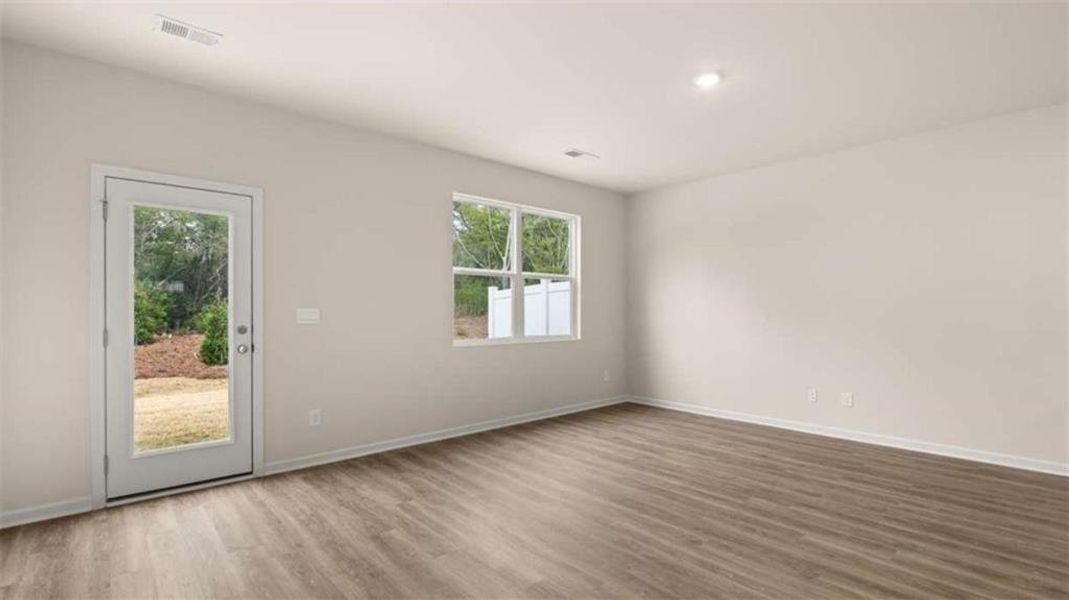 Spacious, unfurnished interior of a new home in Young's Crossing, Stone Mountain (Image 22).
