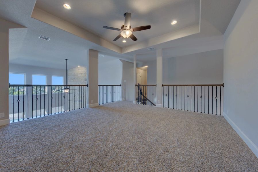 Representative unfurnished interior of a home built from the Barnett by Ashton Woods in Sunday Creek at Kinder Ranch, San Antonio (Image 29).