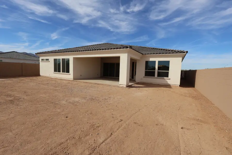 Exterior details and patio area of a home in Sentiero at Windrose, Waddell (Image 4).