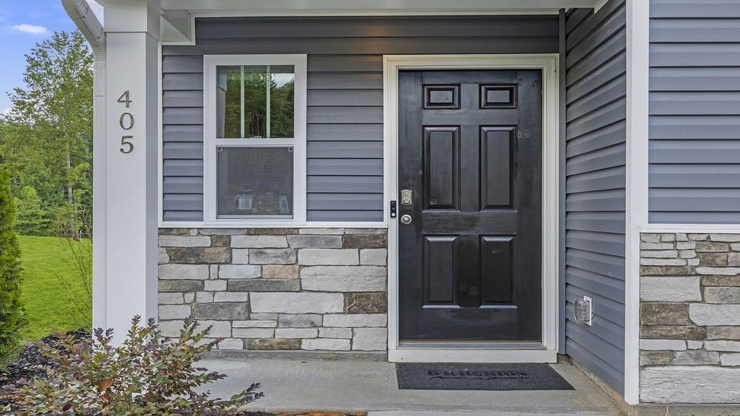 Exterior details and patio area of a home in Seneca Falls, Seneca (Image 2).