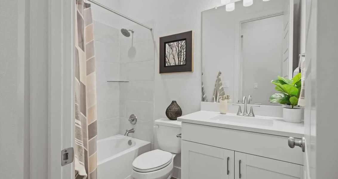 Representative furnished interior of a home built from the Wyatt by Chesmar Homes in Sunfield, Buda (Image 10).