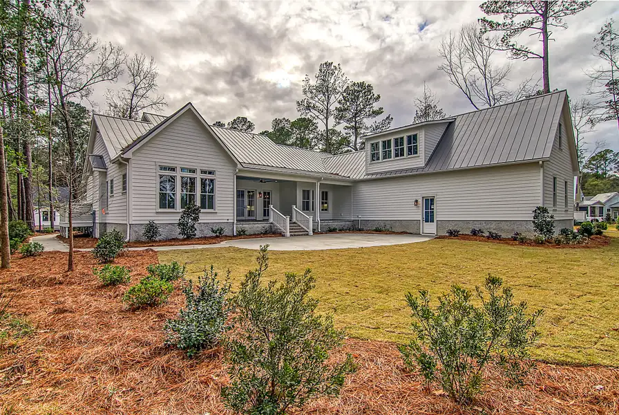 Exterior details and patio area of a home in , Ravenel (Image 2).