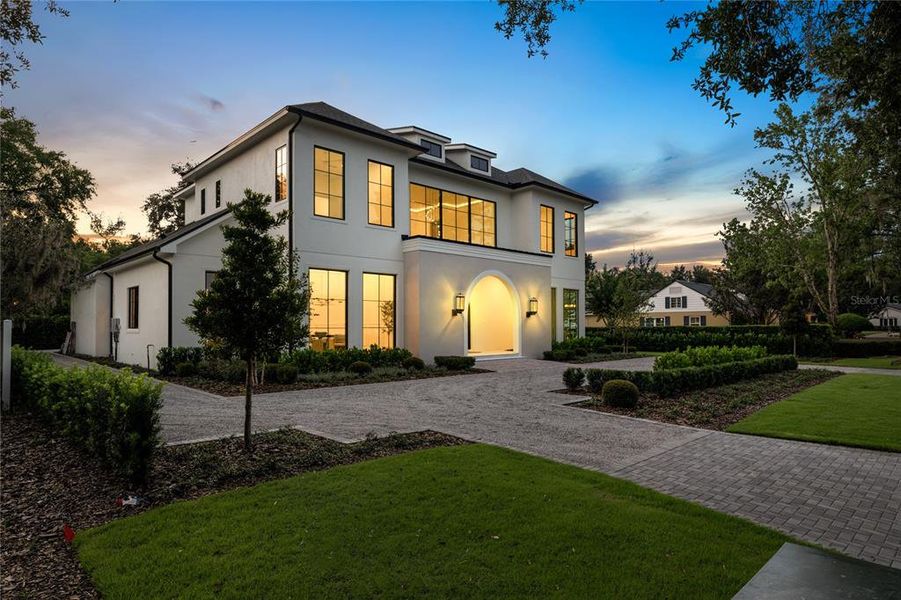Front exterior of a new home in , Winter Park, FL, highlighting curb appeal (Image 25). Front exterior of a new home in , Winter Park, FL, highlighting curb appeal (Image 25).
