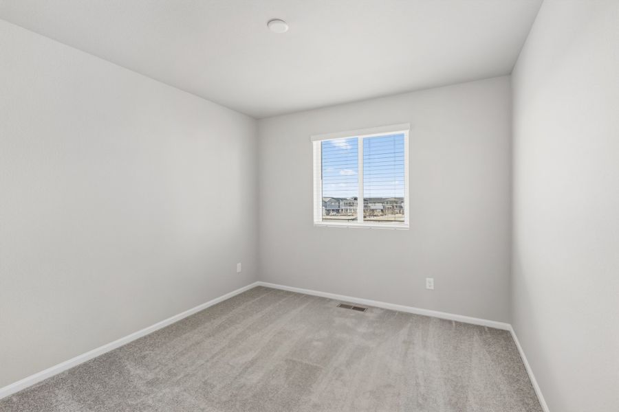 Spacious, unfurnished interior of a new home in Woodrose at Painted Prairie, Aurora (Image 18).