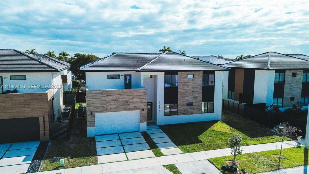 Front exterior of a new home in , Miami, FL, highlighting curb appeal (Image 20).