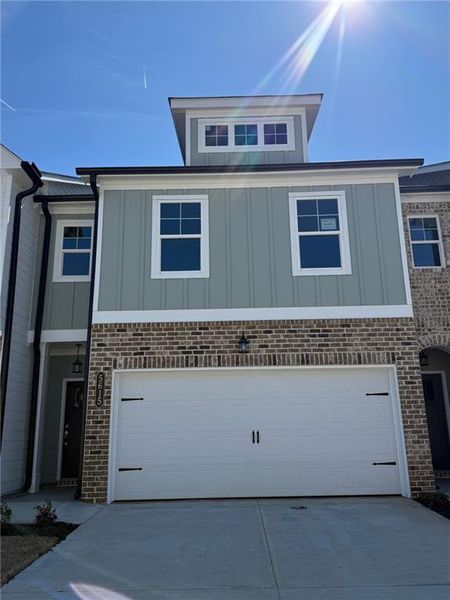 Front exterior of a new home in Caldwell Park, Mableton, GA, highlighting curb appeal (Image 16). Front exterior of a new home in Caldwell Park, Mableton, GA, highlighting curb appeal (Image 16).