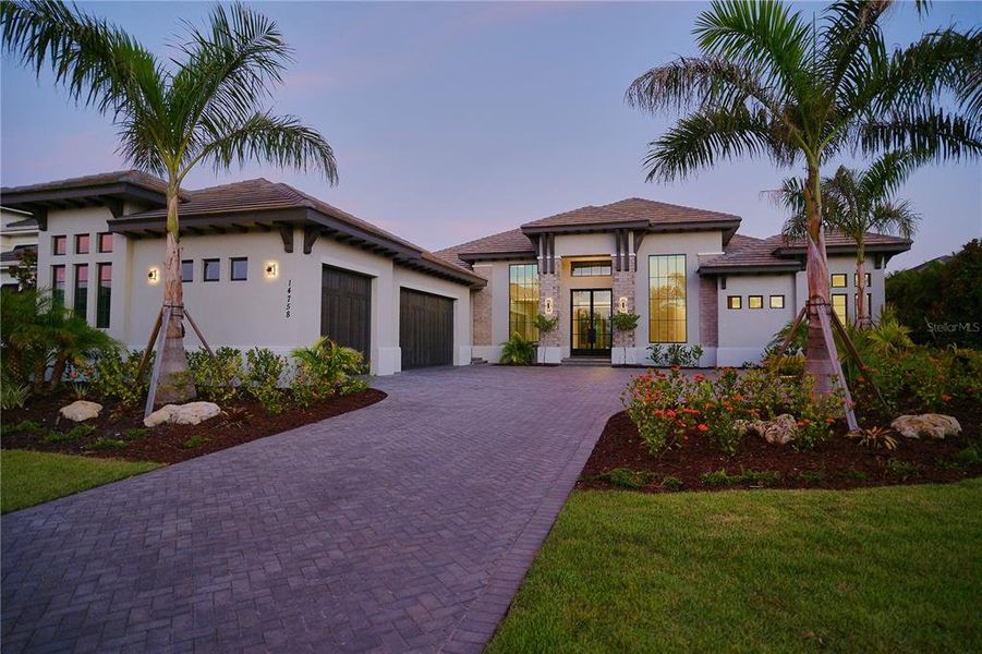 Front exterior of a new home in , Bradenton, FL, highlighting curb appeal (Image 28).