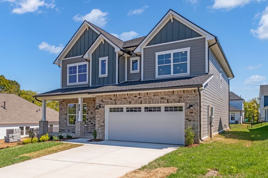 Front exterior of a new home in The Preserve at Five Oaks, Lebanon, TN, highlighting curb appeal (Image 1).