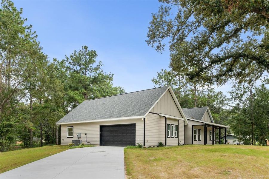 Front exterior of a new home in , Lake City, FL, highlighting curb appeal (Image 24).