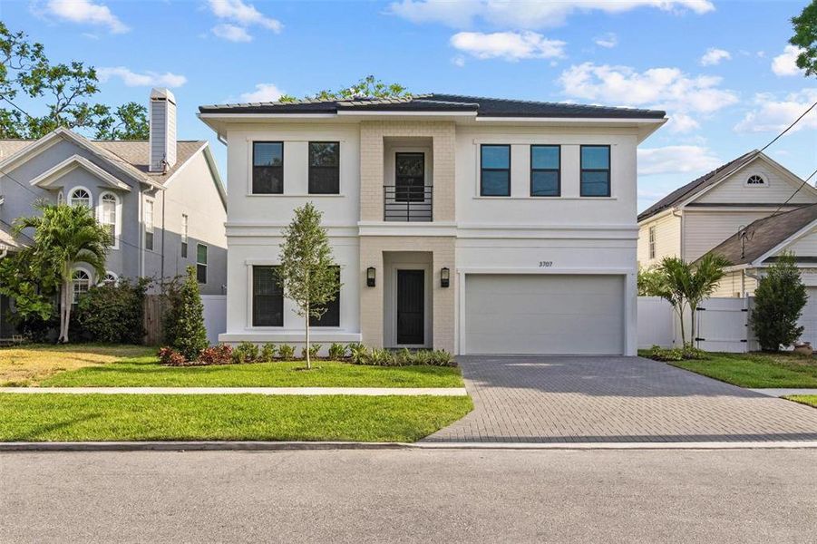 Front exterior of a new home in , Tampa, FL, highlighting curb appeal (Image 21).