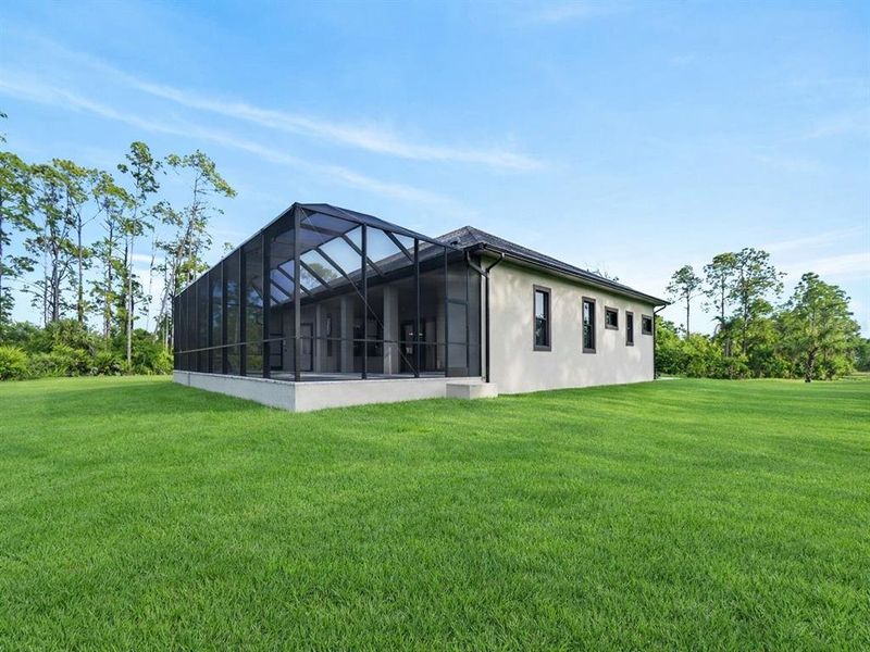 Exterior details and patio area of a home in , Port Charlotte (Image 53).