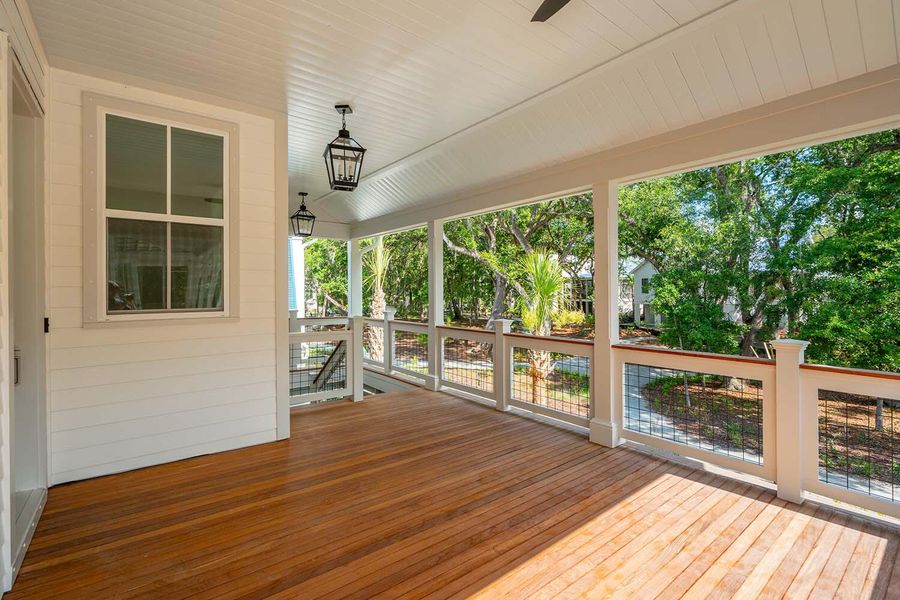 Exterior details and patio area of a home in , Johns Island (Image 29).