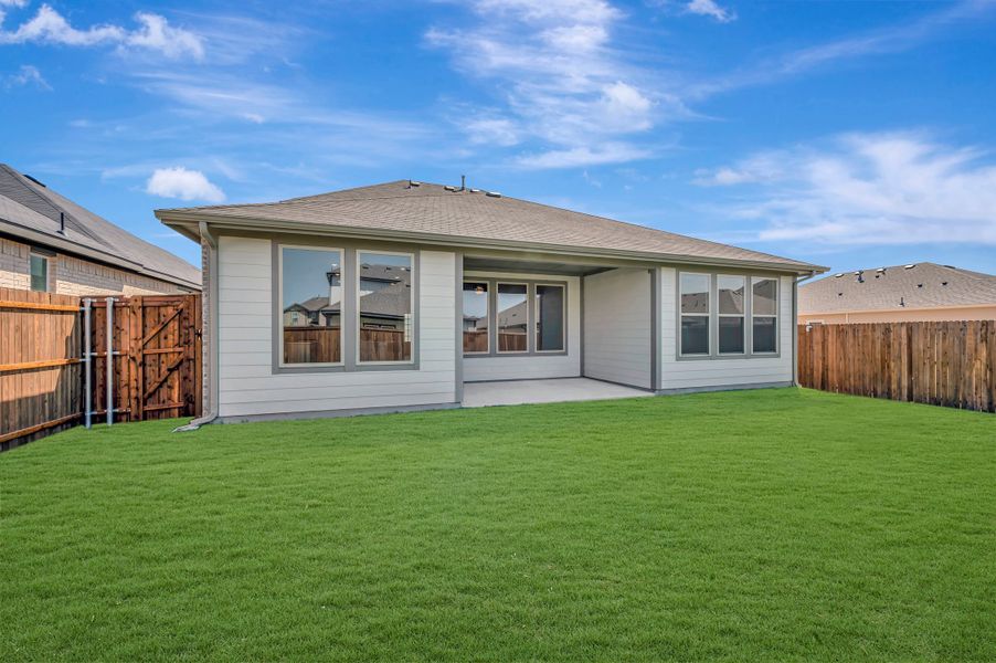 Exterior details and patio area of a home in The Meadows, Denton (Image 19).