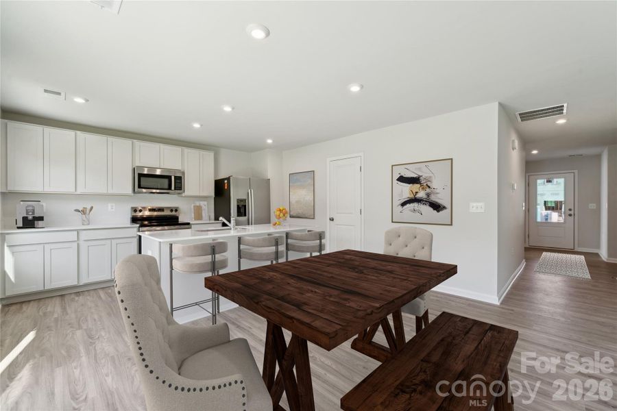 Example Photo Example Photo