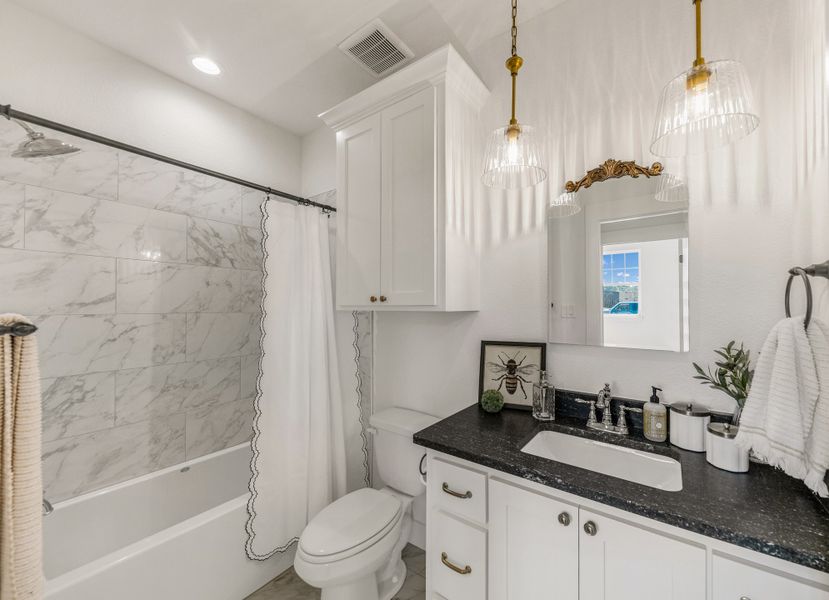 Representative furnished interior of a home built from the The Grayson by Reece Homes in Stella Ranch, Bryan (Image 28).