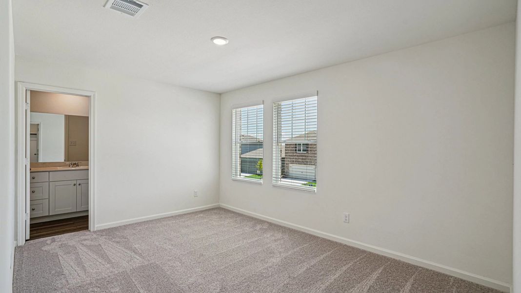 Representative unfurnished interior of a home built from the Pioneer by Starlight Homes in Avalon Ridge, Cut and Shoot (Image 25).