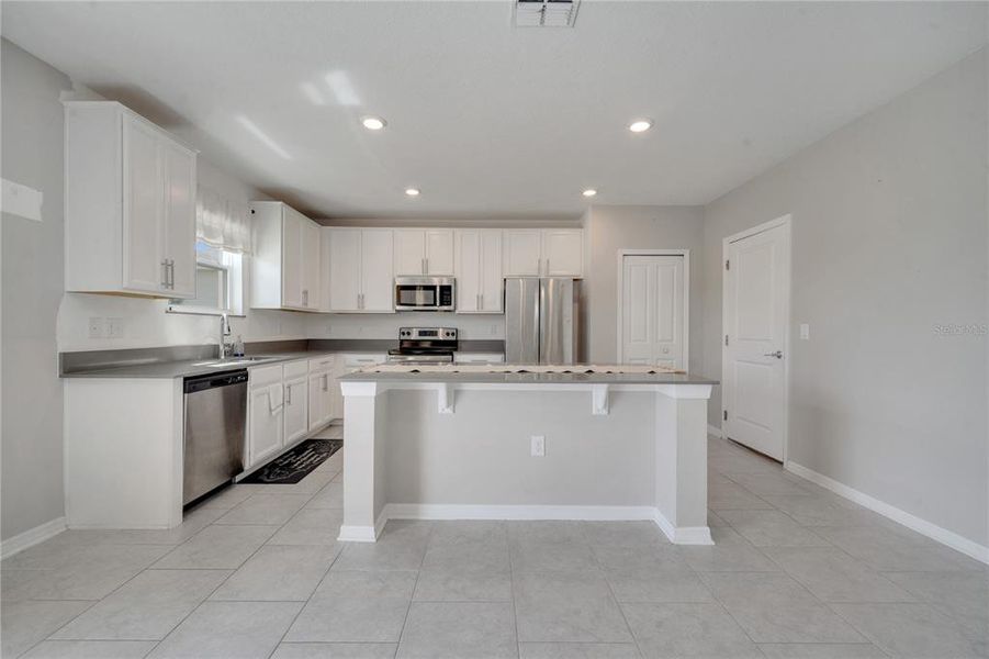 Furnished interior view inside a new home in Cypress Park Estates, Haines City (Image 11).