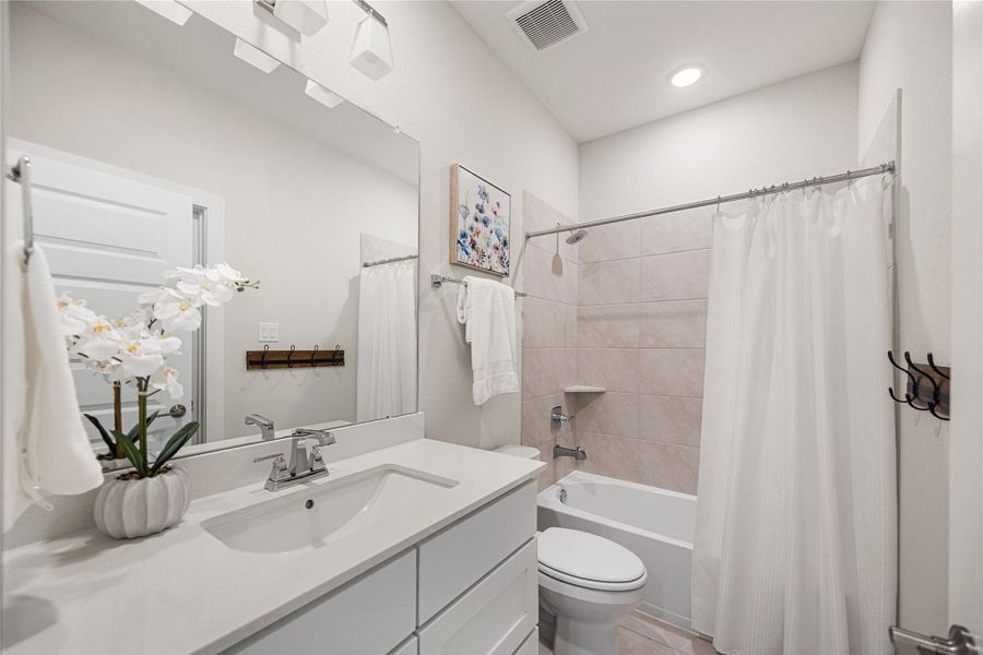 Furnished interior view inside a new home in Woodson’s Reserve, Spring (Image 34).