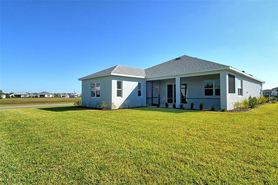 Exterior details and patio area of a home in Canoe Creek, Parrish (Image 20).