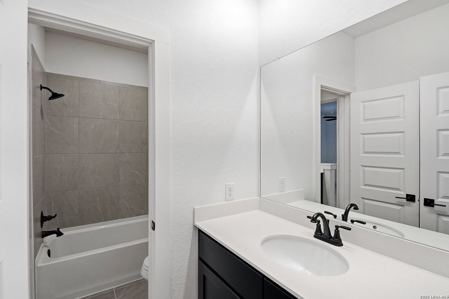 Furnished interior view inside a new home in Prominence Urban, San Antonio (Image 15).