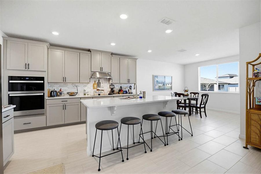 Furnished interior view inside a new home in The Grove at Stuart Crossing - Signature Series, Bartow (Image 5). Furnished interior view inside a new home in The Grove at Stuart Crossing - Signature Series, Bartow (Image 5).