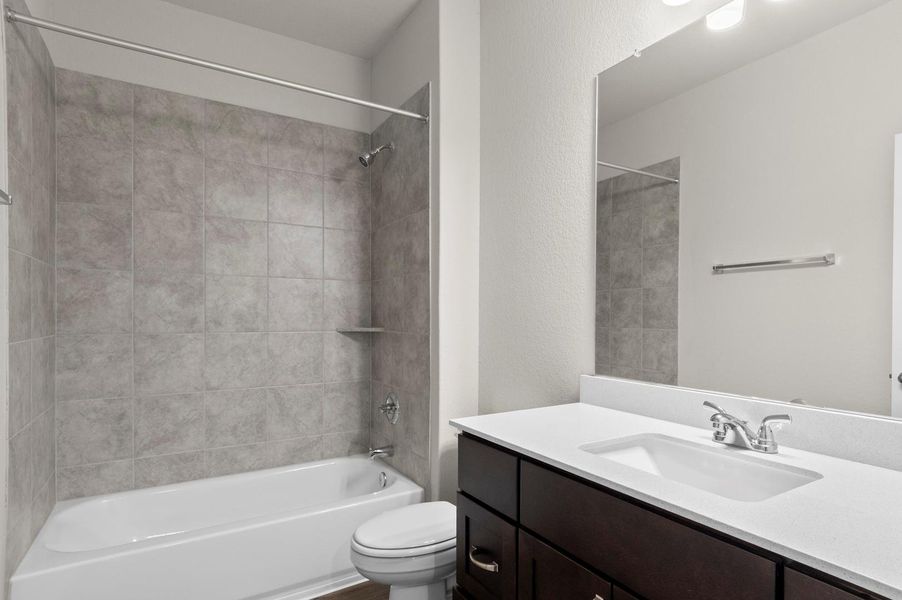 Furnished interior view inside a new home in Oaks at San Gabriel, Georgetown (Image 12).