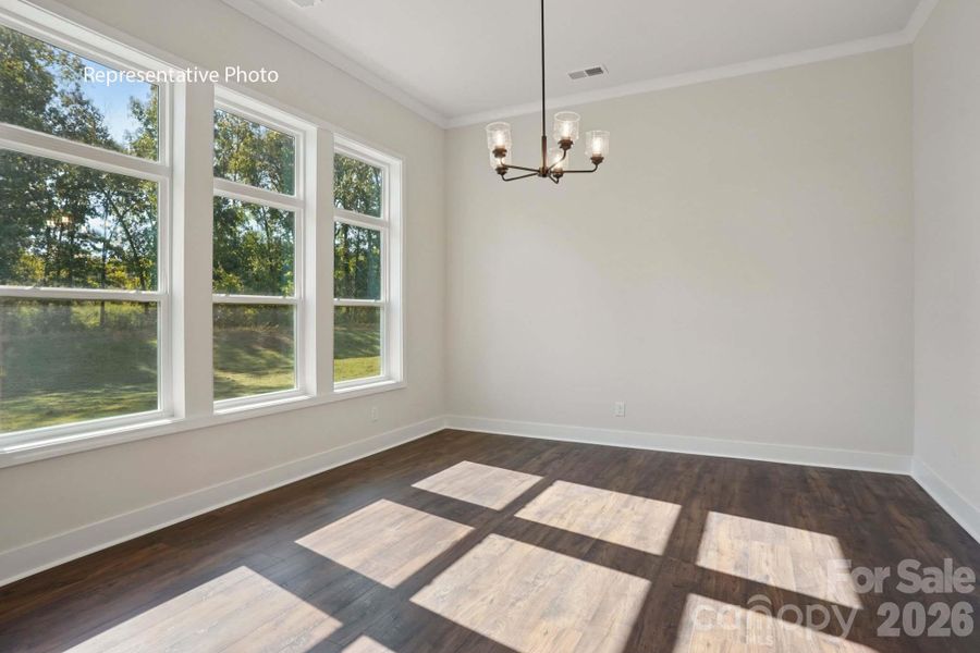 Spacious, unfurnished interior of a new home in Sanctuary at Southgate, Indian Trail (Image 20).
