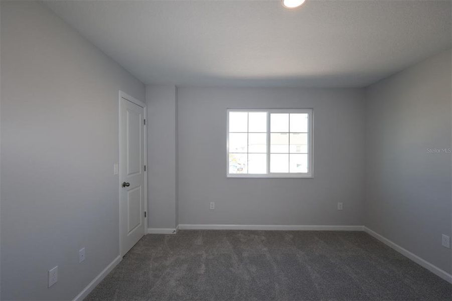Spacious, unfurnished interior of a new home in Tyson Ranch, Orlando (Image 19).