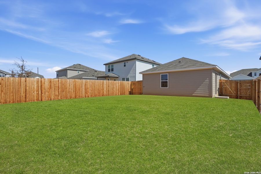 Exterior details and patio area of a home in Vista Real, Converse (Image 27).