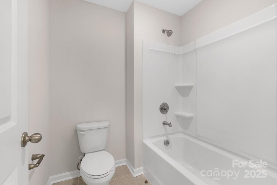 Furnished interior view inside a new home in Sylvan Creek, Denver (Image 19).